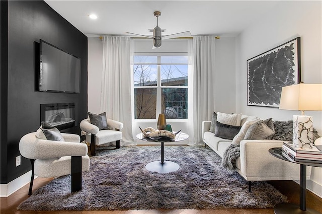 living room featuring ceiling fan