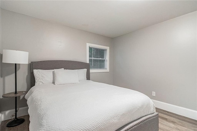 bedroom featuring light wood-type flooring