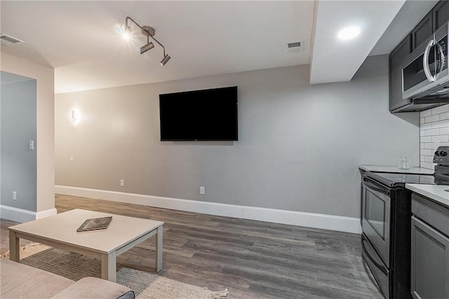 interior space with dark hardwood / wood-style flooring