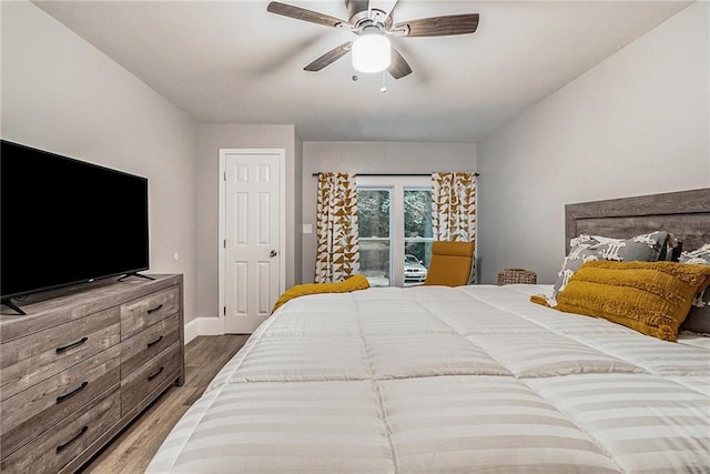 bedroom featuring hardwood / wood-style flooring and ceiling fan