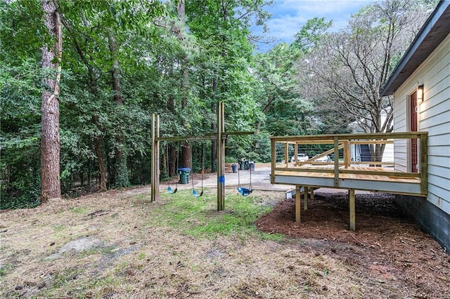 view of yard with a wooden deck