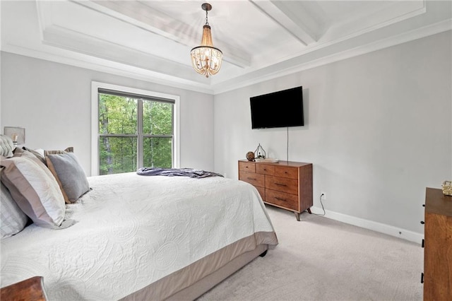 bedroom featuring crown molding, baseboards, light colored carpet, a raised ceiling, and a notable chandelier