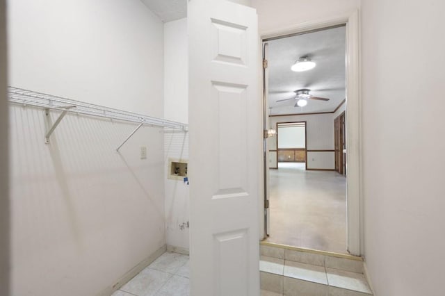 laundry room featuring hookup for a washing machine, light tile patterned floors, a ceiling fan, and baseboards