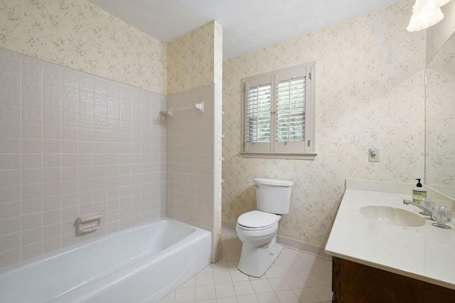full bathroom with tile patterned flooring, wallpapered walls, toilet, vanity, and shower / washtub combination