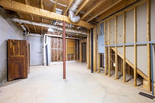 unfinished below grade area with electric panel