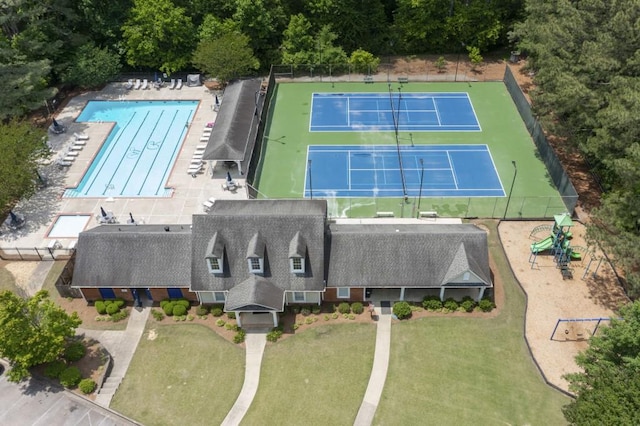 drone / aerial view of a pool area
