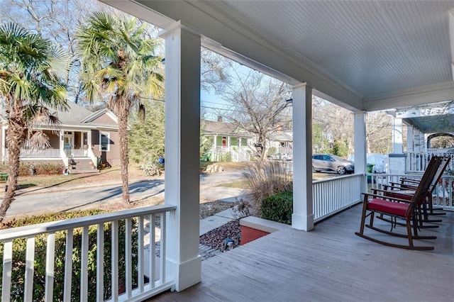 wooden deck featuring a porch