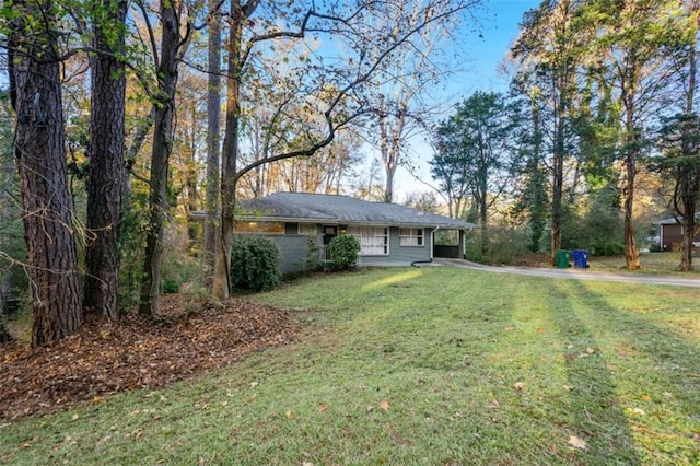 view of yard with a carport