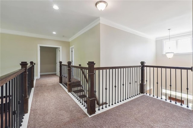 corridor with recessed lighting, an upstairs landing, carpet, and ornamental molding