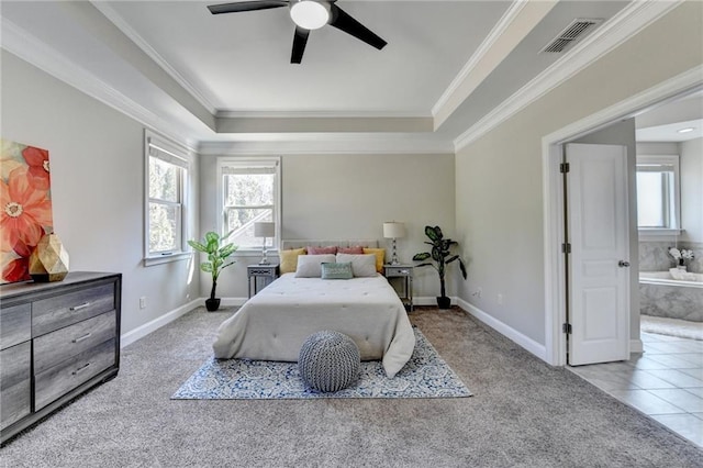 carpeted bedroom with tile patterned floors, visible vents, multiple windows, and ornamental molding