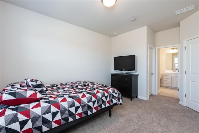 1076 Allspice Way, Lawrenceville, GA 30045 - bedroom with ensuite bathroom and light colored carpet