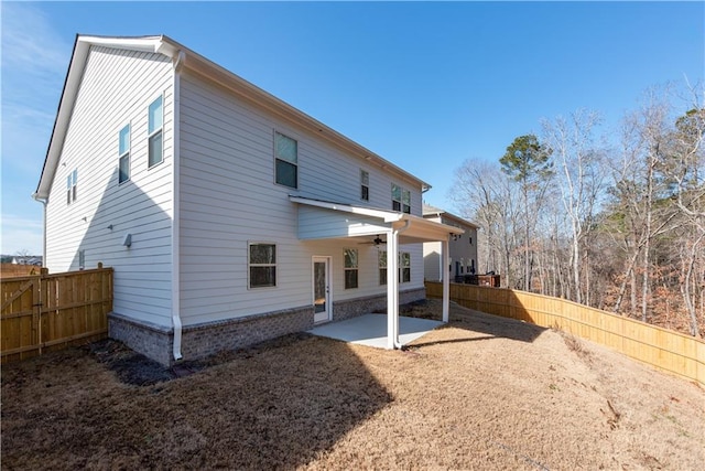 1076 Allspice Way, Lawrenceville, GA 30045 - rear view of property with a patio area
