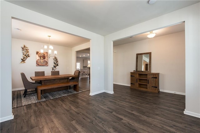 1076 Allspice Way, Lawrenceville, GA 30045 - dining room featuring a notable chandelier and dark hardwood / wood-style flooring