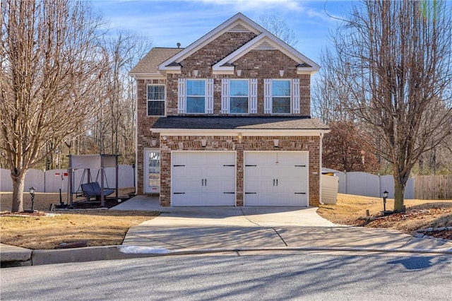 view of front of home with a garage