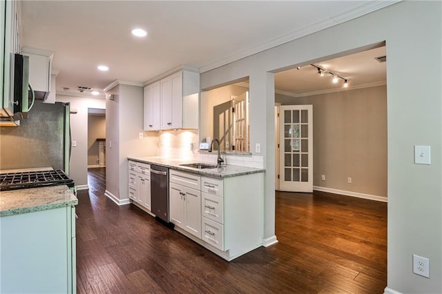 kitchen featuring dark wood-style floors, backsplash, appliances with stainless steel finishes, ornamental molding, and a sink