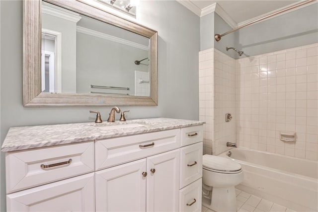 full bathroom featuring toilet, ornamental molding, washtub / shower combination, vanity, and tile patterned floors