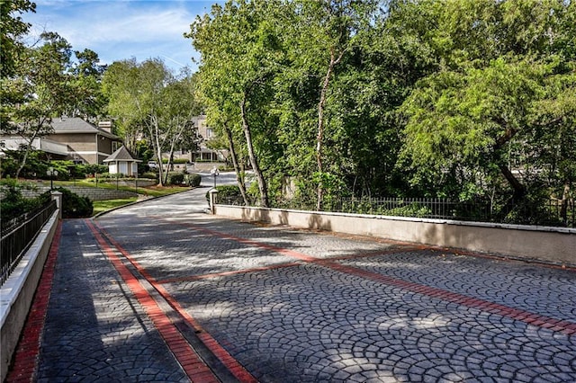 view of street featuring curbs