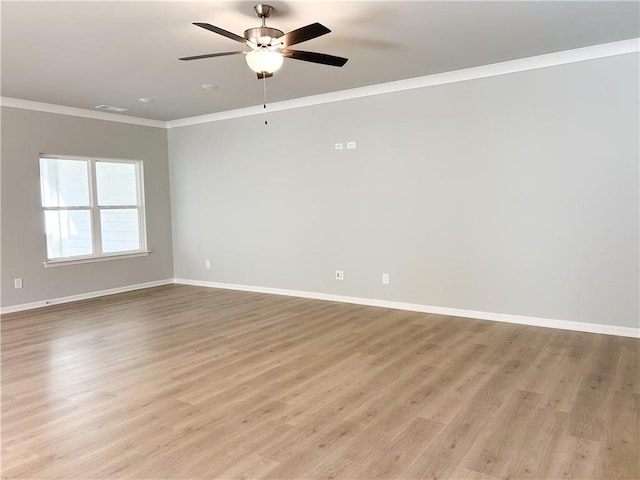 empty room with light hardwood / wood-style floors, ceiling fan, and ornamental molding