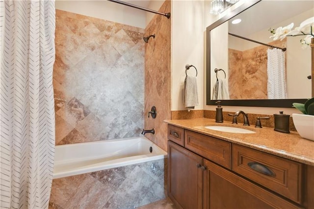 bathroom with shower / bathtub combination with curtain and vanity