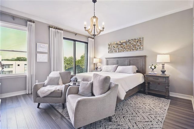 bedroom with an inviting chandelier, dark wood-type flooring, and ornamental molding