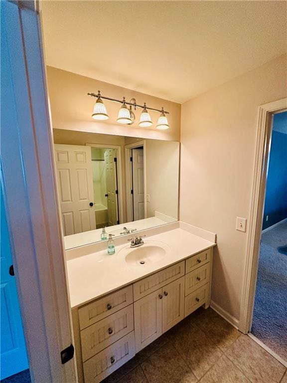 bathroom featuring tile patterned floors and vanity