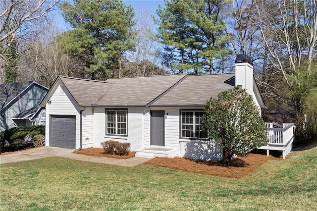 single story home with brick siding, a front lawn, a chimney, driveway, and an attached garage