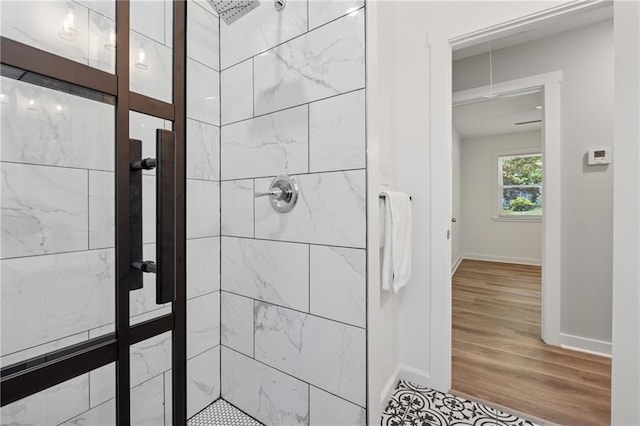 2060 Panstone Ct SW, Marietta, GA 30060 - full bathroom featuring a stall shower, wood finished floors, and baseboards