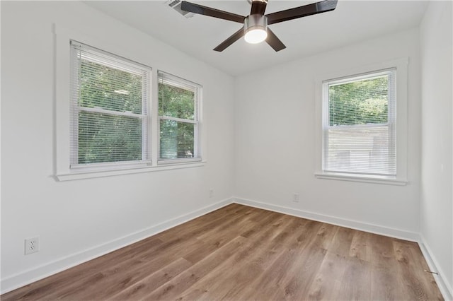 2060 Panstone Ct SW, Marietta, GA 30060 - spare room with light wood finished floors, baseboards, and ceiling fan