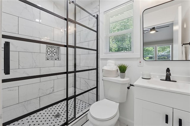 2060 Panstone Ct SW, Marietta, GA 30060 - bathroom with ceiling fan, toilet, vanity, and a stall shower