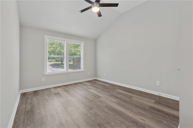 2060 Panstone Ct SW, Marietta, GA 30060 - empty room featuring a ceiling fan, wood finished floors, vaulted ceiling, and baseboards