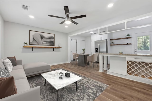 2060 Panstone Ct SW, Marietta, GA 30060 - living area featuring wood finished floors, a ceiling fan, recessed lighting, and baseboards