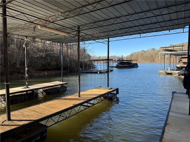 view of dock with a water view