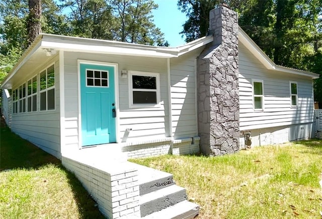 2346 Pryor Rd SW, Atlanta, GA 30315 - back of house with a chimney and a lawn