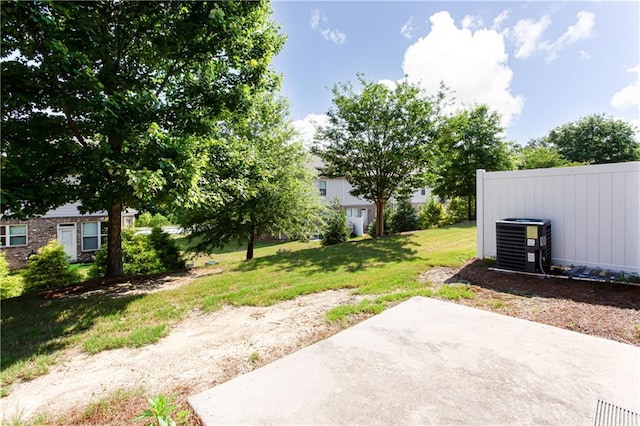 view of yard featuring a patio area and cooling unit