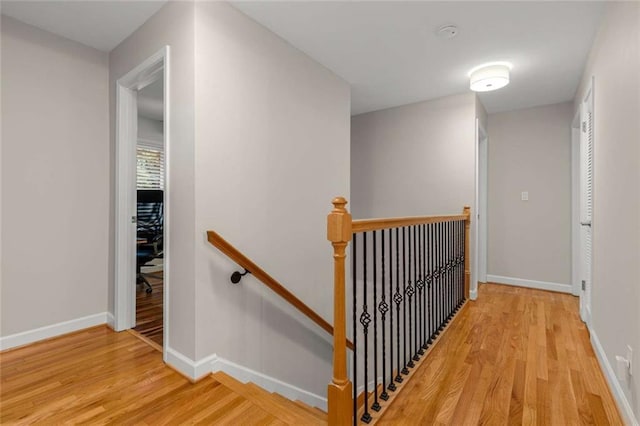 2892 Guinevere Dr NE, Atlanta, GA 30345 - corridor featuring an upstairs landing, light wood finished floors, and baseboards