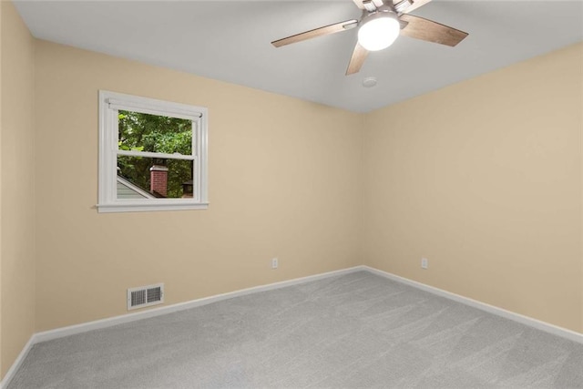 2892 Guinevere Dr NE, Atlanta, GA 30345 - spare room with carpet floors, baseboards, and ceiling fan