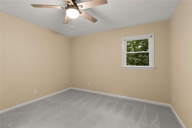 2892 Guinevere Dr NE, Atlanta, GA 30345 - spare room featuring light carpet, baseboards, and ceiling fan