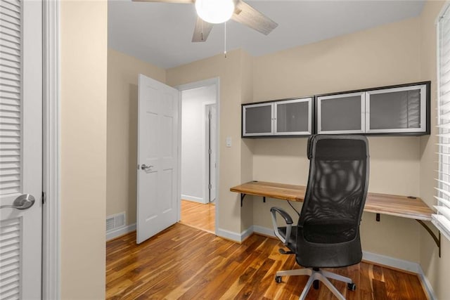 2892 Guinevere Dr NE, Atlanta, GA 30345 - unfurnished office featuring wood finished floors, baseboards, and a ceiling fan