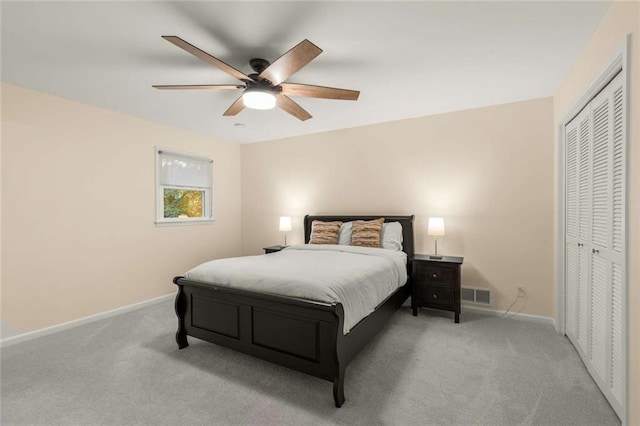 2892 Guinevere Dr NE, Atlanta, GA 30345 - bedroom featuring carpet, a closet, baseboards, and a ceiling fan