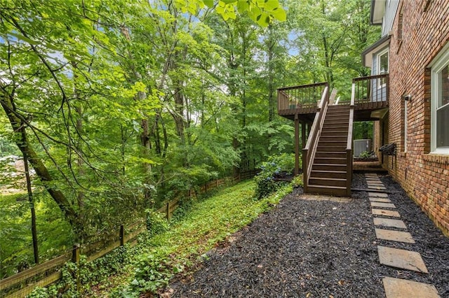 2892 Guinevere Dr NE, Atlanta, GA 30345 - view of yard featuring stairway and a deck