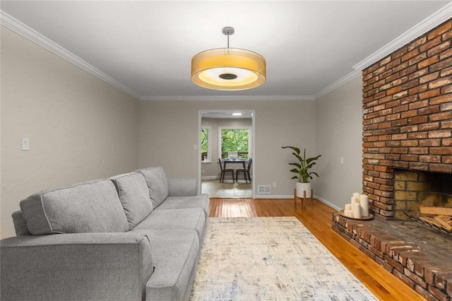 2892 Guinevere Dr NE, Atlanta, GA 30345 - living area with wood finished floors, crown molding, a fireplace, and baseboards