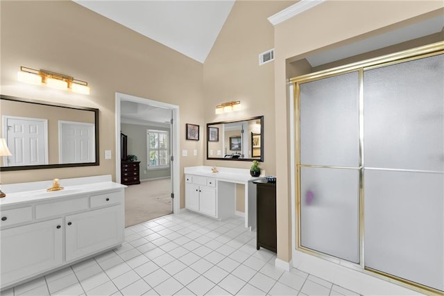 full bathroom featuring two vanities, visible vents, a sink, and a shower stall