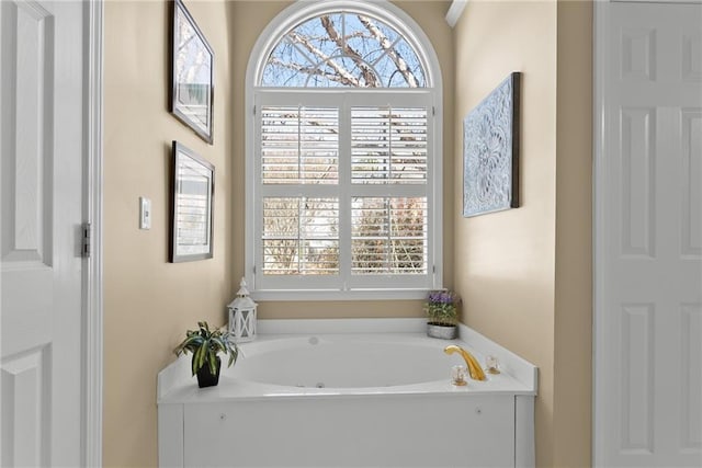 full bath with a garden tub