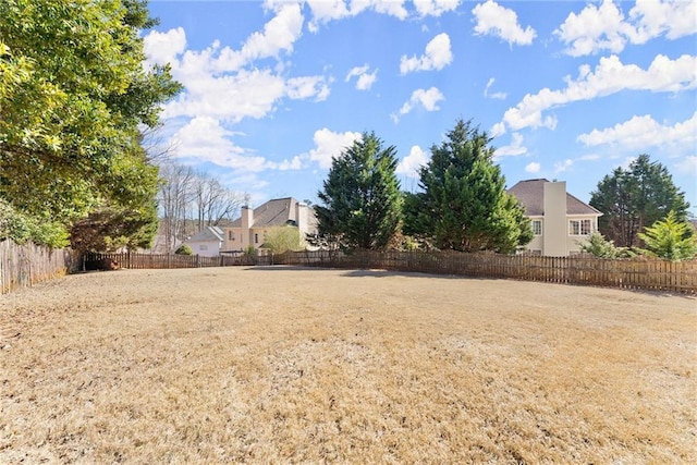 view of yard with fence