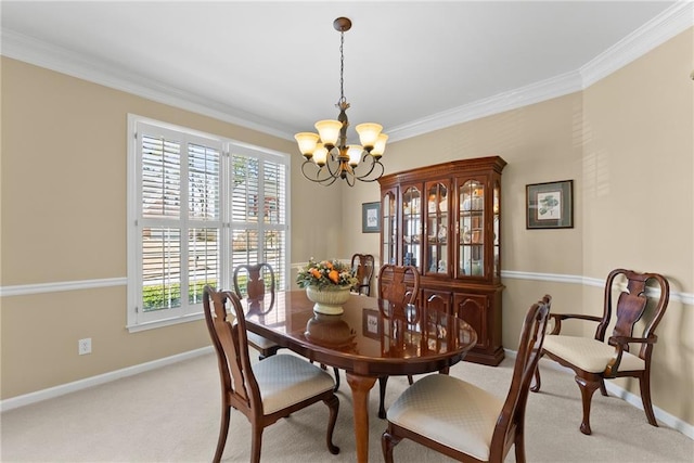 dining area with ornamental molding, light carpet, baseboards, and an inviting chandelier