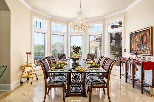 dining room with a chandelier, crown molding, and a healthy amount of sunlight