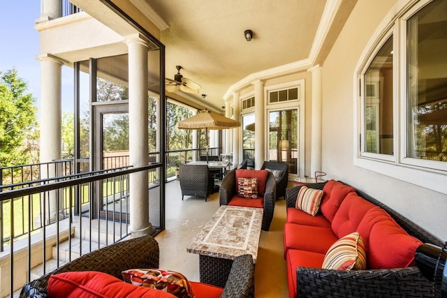 balcony with ceiling fan and outdoor lounge area