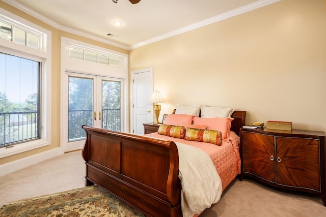 carpeted bedroom with french doors, ceiling fan, access to exterior, and ornamental molding