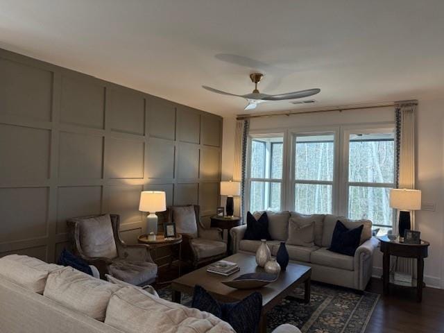 63 Aspen Way, Dallas, GA 30157 - living room with a decorative wall, ceiling fan, and dark wood-style flooring