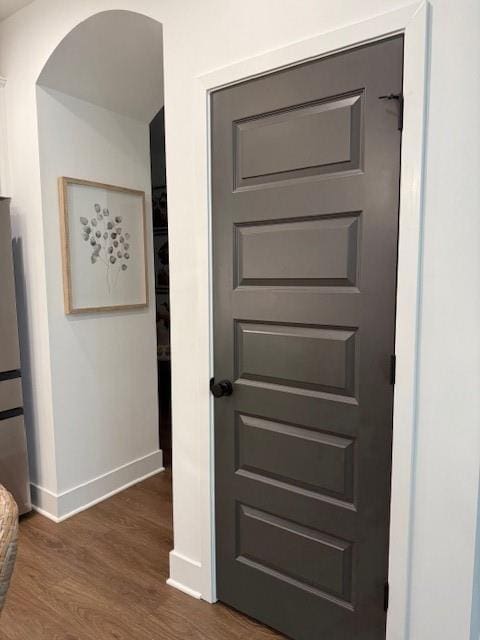 63 Aspen Way, Dallas, GA 30157 - detailed view of baseboards, freestanding refrigerator, and wood finished floors